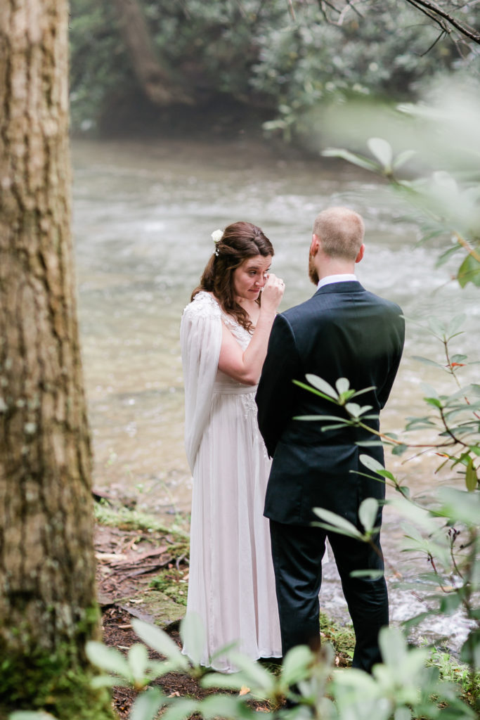 Bride cries while reading vows to groom privately by a stream