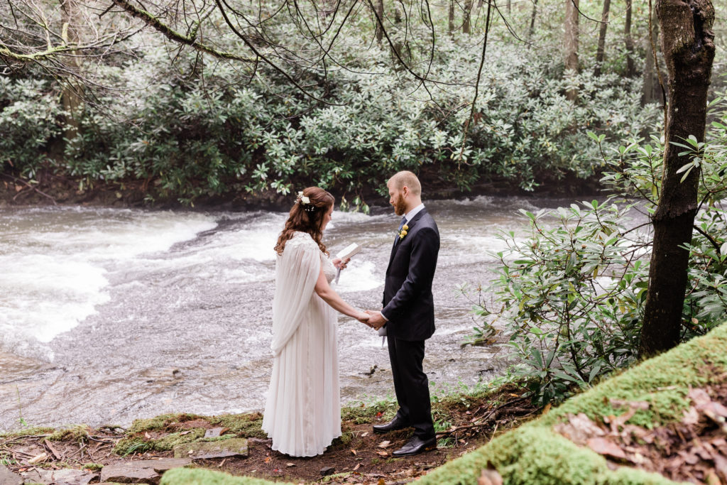 Bride reads vows to groom privately by a stream