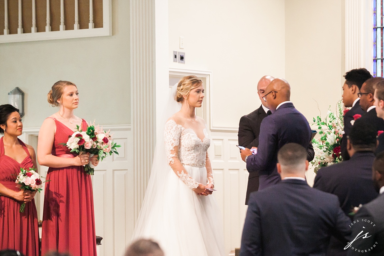 groom reads his wedding vows to the bride