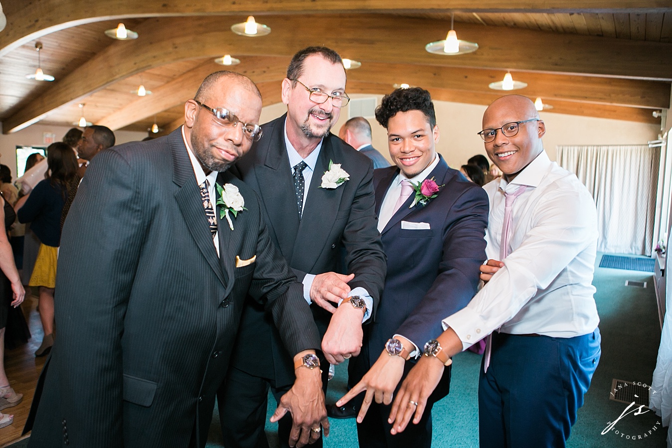 groom and family show off watches