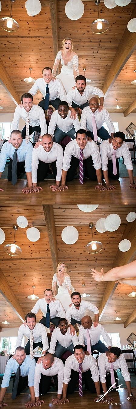bride climbs on top of a human pyramid