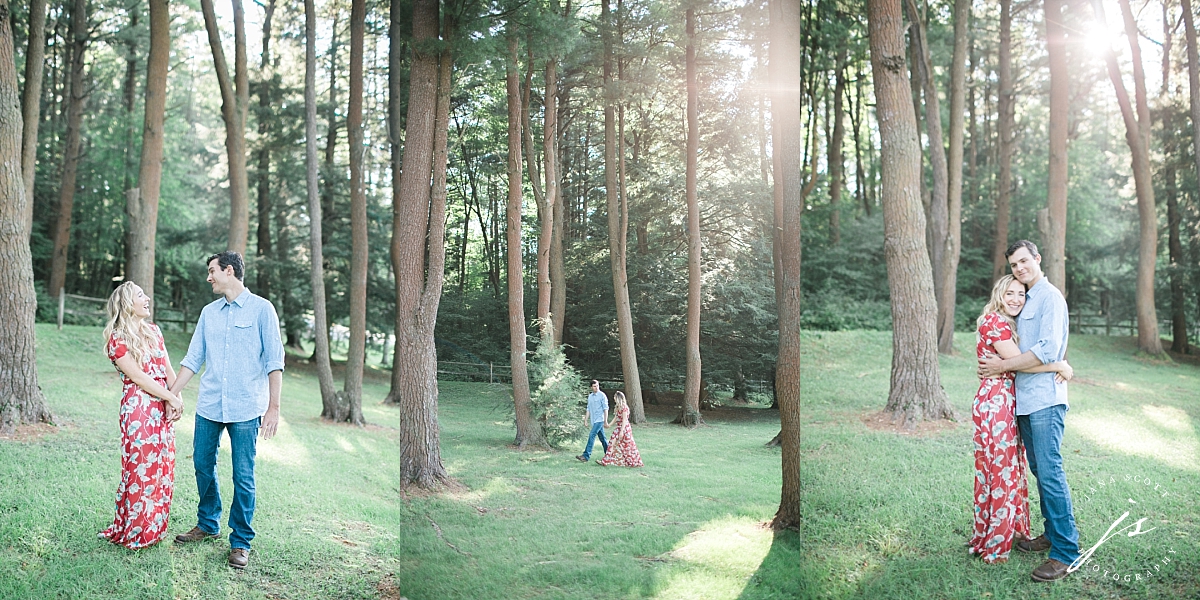 couple walking through the pines
