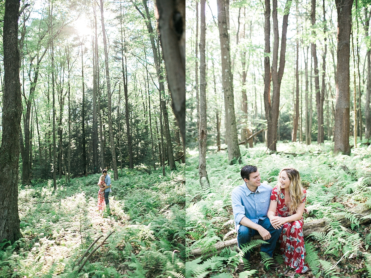 couple laughs in the forest