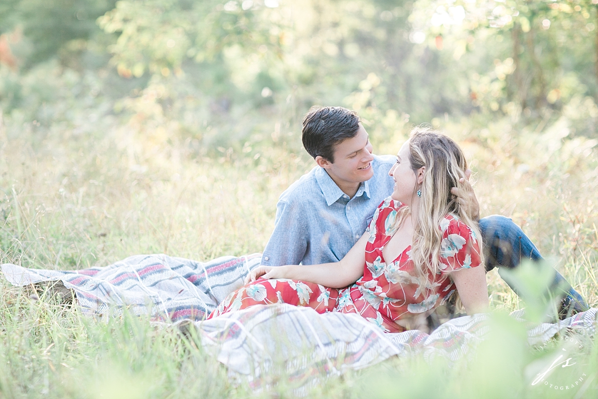 engagment photos on a blanket