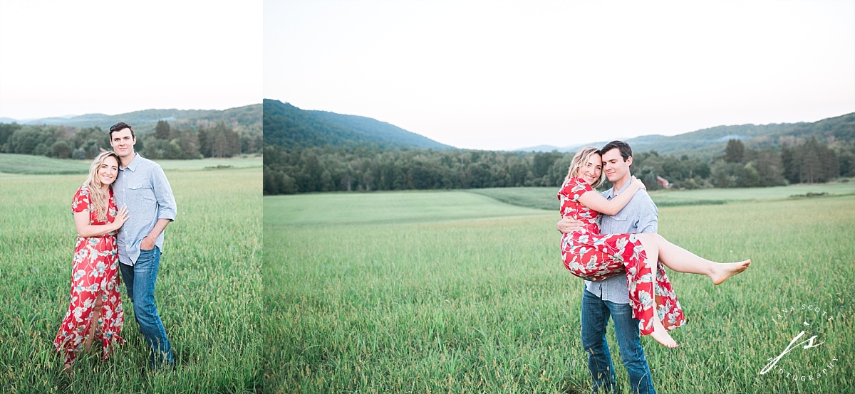 guy carrying barefoot girl for engagement session photo in a field